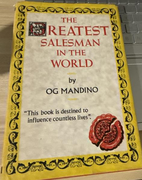 The Greatest Salesman in the World book cover by Og Mandino with vintage yellow border and wax seal design